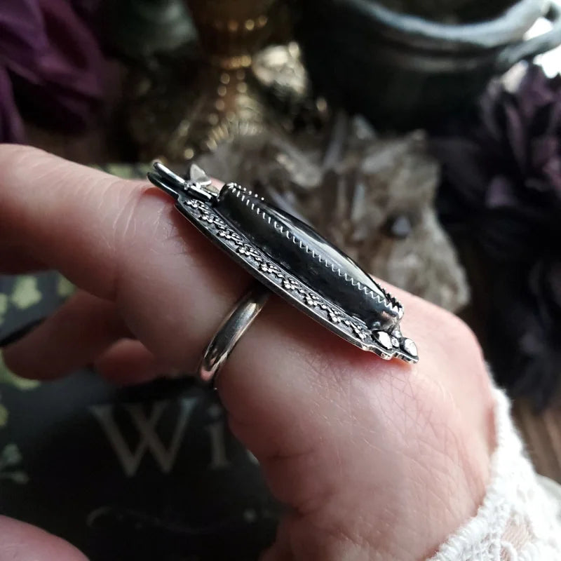 a person holding a knife in their hand