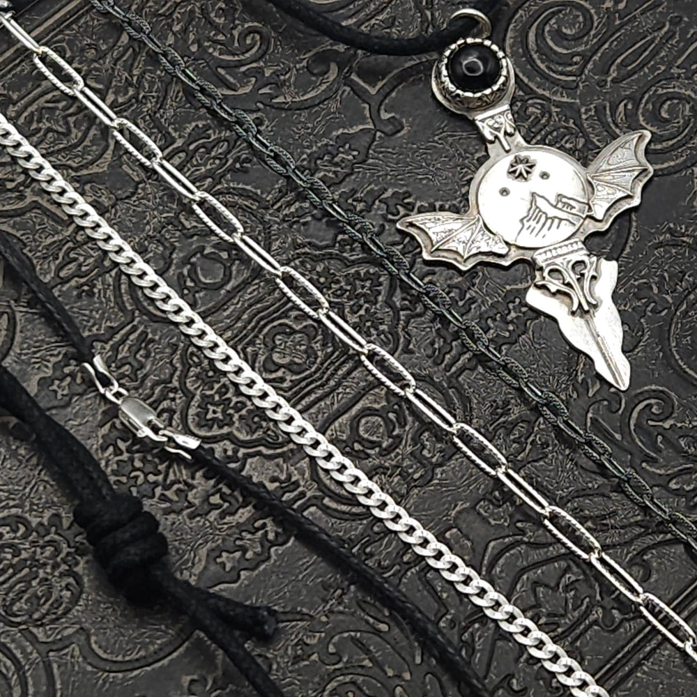 Assorted necklaces and pendant.